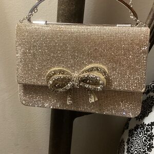 ANTONIO MELANI Sparkling Silver Clutch with Bow Detail